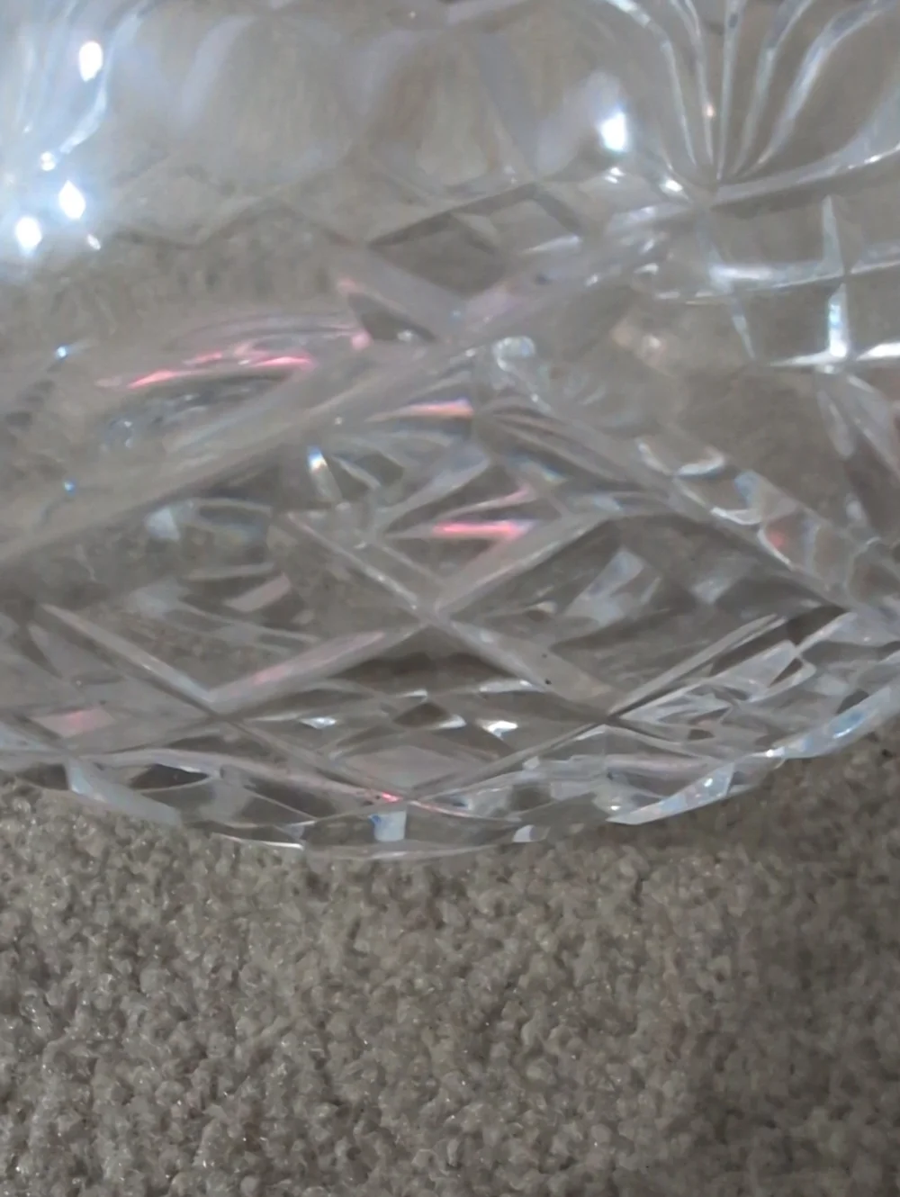 vintage cut crystal rose bowl featuring a diamond and fan pattern.